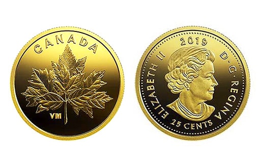 четыре кленовых листа на золотой монете Канады