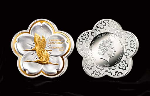 Килограммовая монета из серебра с селективной позолотой и бриллиантовой инкрустацией.