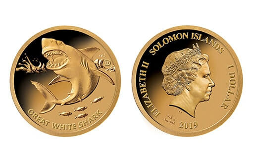 монета из золота с изображением большой белой акулы
