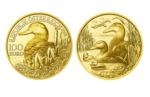 Дикая утка кряква на золотых монетах австрийского государства