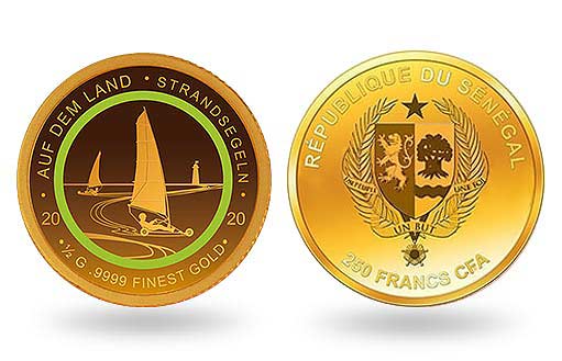 парусная яхта изображена на золотой монете Сенегала