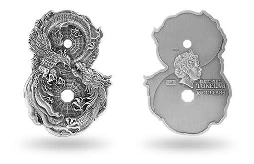 для Токелау изготовили из серебра фигурную монету с драконом и фениксом