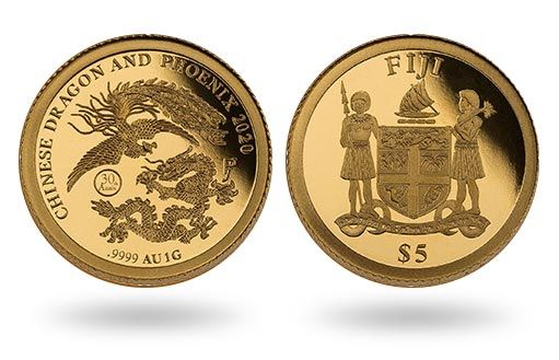 дракон и феникс на золотой монете по эмитенту Фиджи