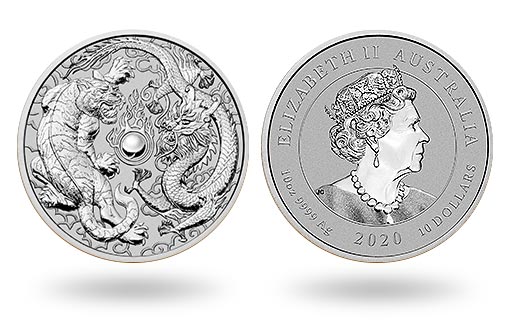 на серебряной монете Австралии изображены дракон и тигр