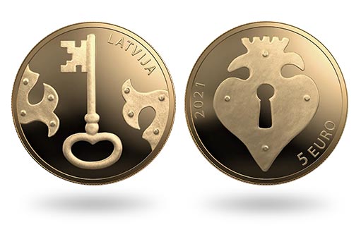 коллекционная монета Латвии из золота с оригинальным дизайном в виде ключа и замочной скважины