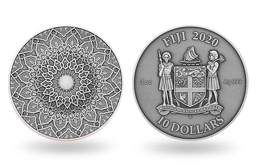 мандала с белой яшмой на серебряной монете Фиджи