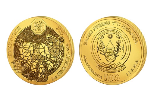 Золотая монета со свинкой от Руанды