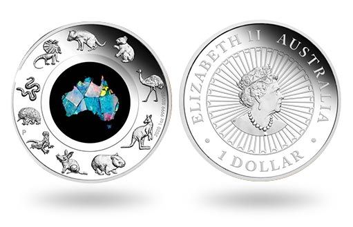 серебряная монета Австралии украшена опаловой вставкой в форме материка