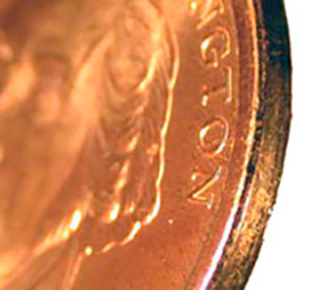 Президентский доллар 2007 года с пропавшей кромкой надписи