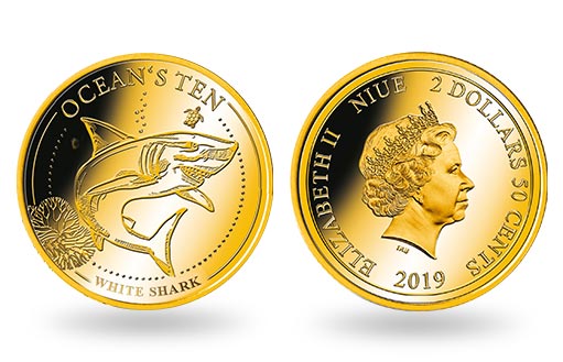 золотые монеты Ниуэе с большой белой акулой